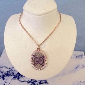 Gucci upcycled necklace. Worn once. Like new. AB crystal. gold / rose gold tone.